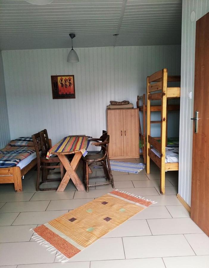 Domki Pod Lasem พวอนส์ค ภายนอก รูปภาพ